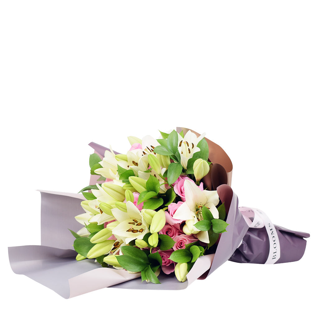 Pink Roses and Lilies Wrapped Bouquet – how the gift is presented