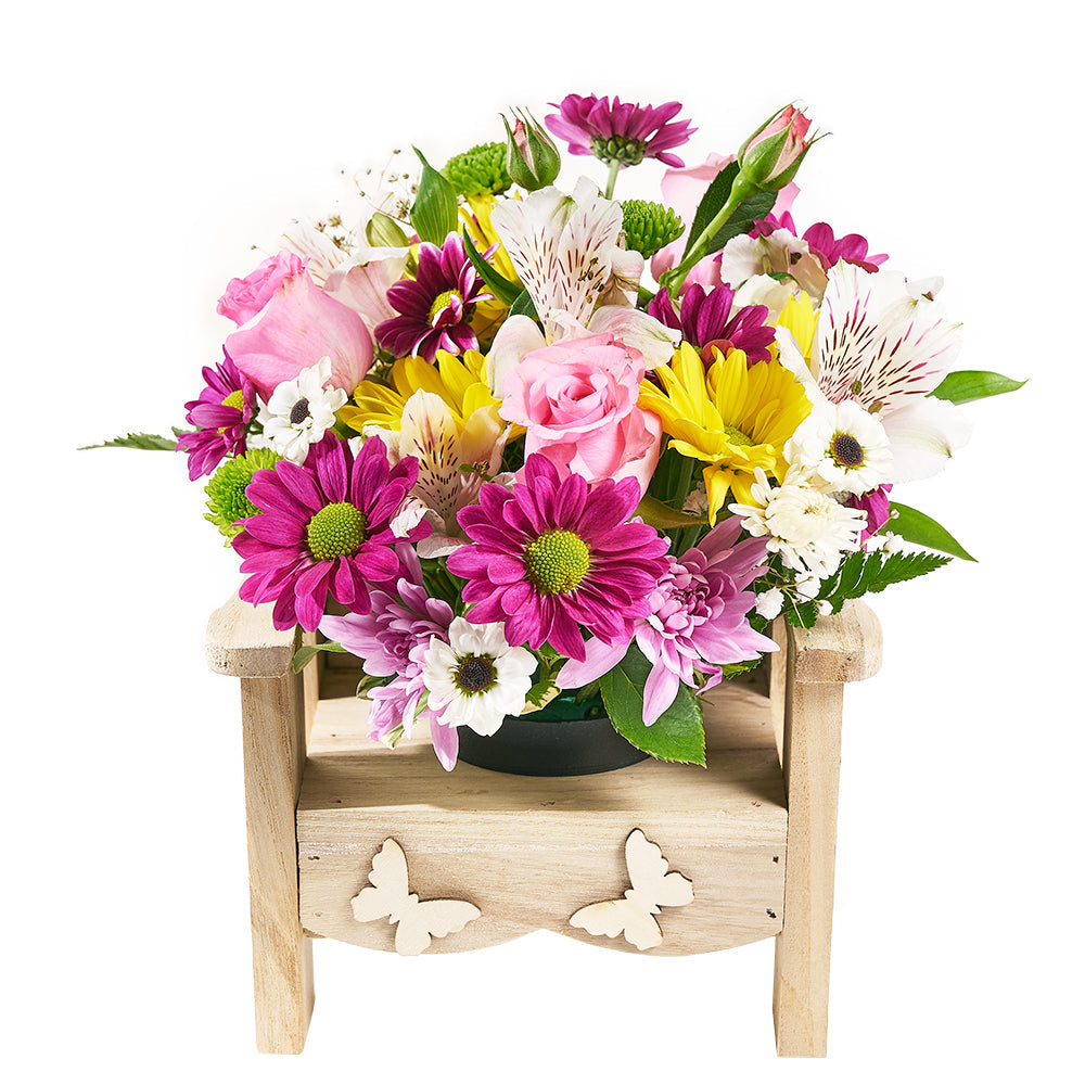 Mixed Floral Arrangement in Planter Chair – how the gift is presented