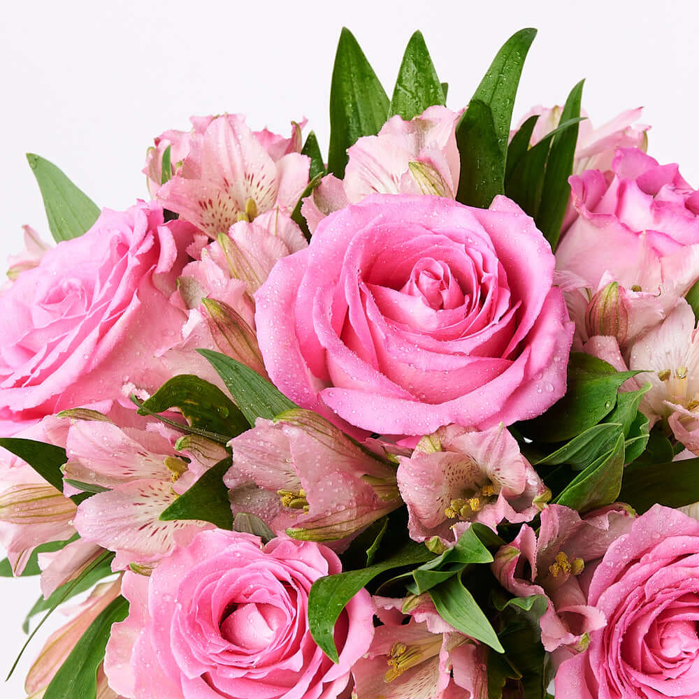 Utterly Captivating Mixed Arrangement, pink roses and alstroemeria. This fresh floral arrangement is a charming piece of natural beauty, certain to brighten someone's day, Floral Gifts from Vancouver Blooms - Same Day Vancouver Delivery.