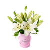 Wondrous Cream Lily Hat Box, a collection of elegant white lilies arranged in a charming pink hat box, Floral Gifts from Vancouver Blooms - Same Day Vancouver Delivery.