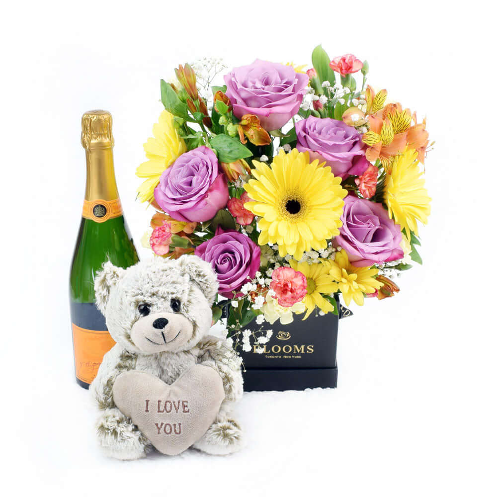 The Extravagant Floral Sunrise Mixed Arrangement &amp; Gift Set, Mixed Flower Hat Box with Plush Teddy Bear and Champagne, from Vancouver Blooms - Same Day Vancouver Delivery.