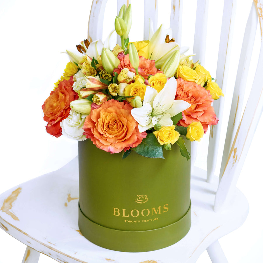 The Summer Glow Mixed Arrangement features a selection of beautiful roses, lilies, daisies, alstroemeria and carnations in a sleek designer box – ready to be delivered to your loved ones on any special occasion.  Vancouver Delivery