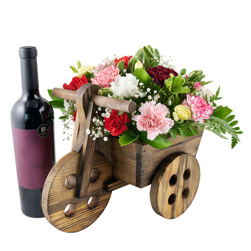 Carnation floral arrangement in a wooden cart planter. Same Day Vancouver Delivery.