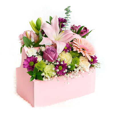 Pink and white mixed floral arrangement in a pink toolbox. Same Day Vancouver Delivery.