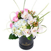 This gift highlights the beauty of hydrangeas, cymbidium orchids, roses, and more in a lovely hat box that makes a lovely centerpiece.  Vancouver Delivery