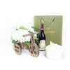 A Lovely Celebration Flowers & Wine Gift, Hydragea Flower in a wooden bicycle planter with Wine and Cake, from Vancouver Blooms - Same Day Vancouver Delivery.