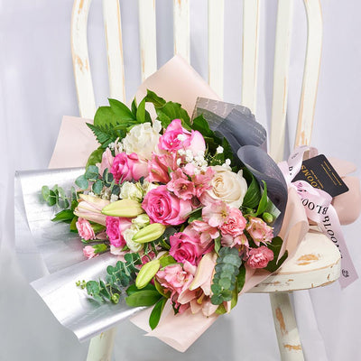 Pastel Dreams Mixed Rose Bouquet, is one of our most popular flower gifts from Vancouver Blooms - Same Day Vancouver Delivery.