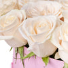 Delicate White Rose Gift Box, assortment of white roses arranged in a pink hat box for a stunning presentation, Floral Gifts from Vancouver Blooms - Same Day Vancouver Delivery.