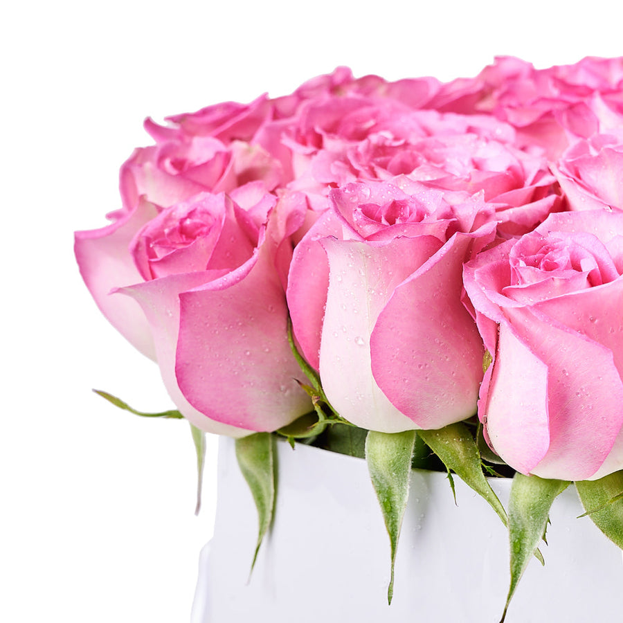 Luxe Pink Rose Gift Box, a variety of luxurious pink roses elegantly arranged in a white hat box for a sophisticated yet stunning gift, Floral Gifts from Vancouver Blooms - Same Day Vancouver Delivery.