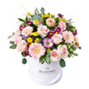 Striking Mixed Garden Arrangement, a vibrant blend of roses, daisies, Gerbera, alstroemeria, and more, artfully arranged in a round, white box for a charming display, Floral Gifts from Vancouver Blooms - Same Day Vancouver Delivery.