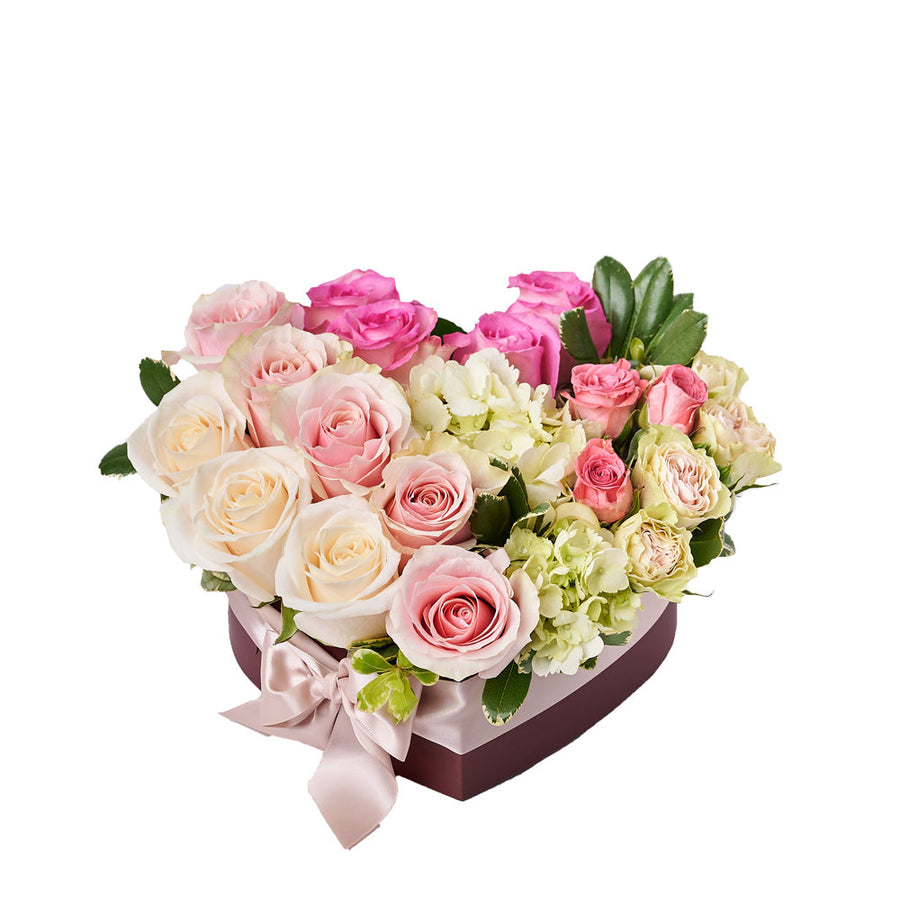 Heart of Roses Arrangement, a heartfelt gift featuring pink and white roses, hydrangea, spray roses, and more arranged in a charming heart-shaped box. Floral Gifts from Vancouver Blooms - Same Day Vancouver Delivery.