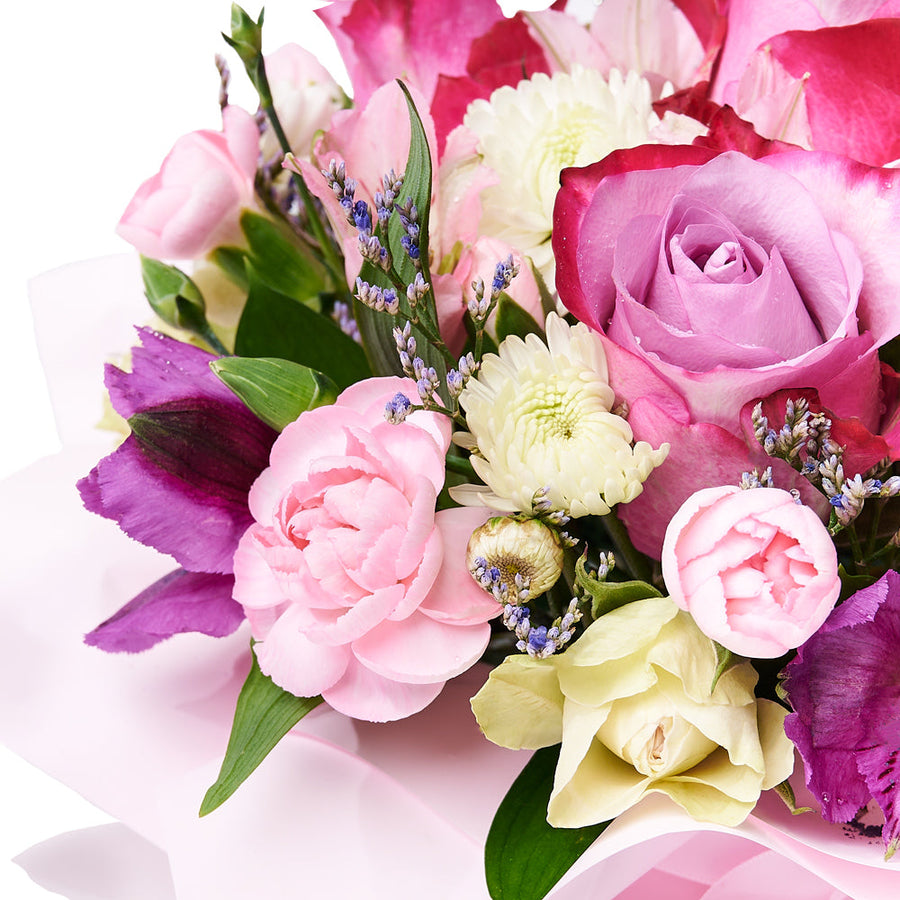 Dazzling Mixed Box Arrangement, a variety of fresh flowers, including roses, carnations, daisies, and alstroemeria, elegantly arranged in a pink hat box, Floral Gifts from Vancouver Blooms - Same Day Vancouver Delivery.