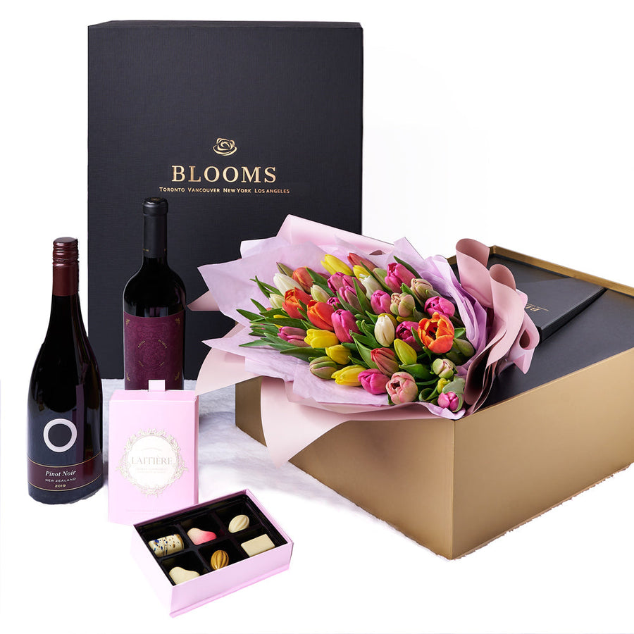 Resplendent Spring Tulip Gift Set, a sizable bouquet of tulips, elegantly wrapped and tied with ribbon, carefully placed in a flower gift box alongside two bottles of wine and a box of chocolate truffles, Floral Gifts from Vancouver Blooms - Same Day Vancouver Delivery.