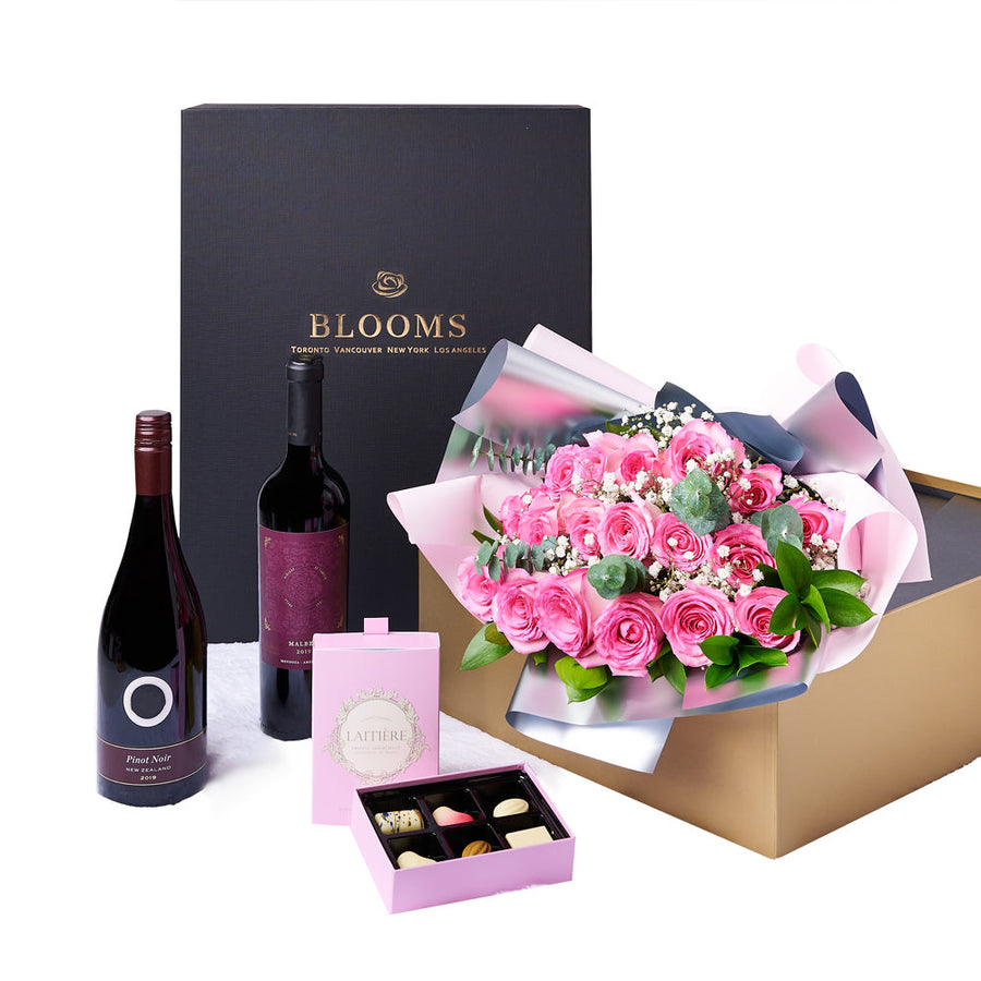 The Complete Pink Rose & Wine Gift Set, a selection of pink roses and greens gathered into a floral wrap and tied with ribbon and presented in a flower box alongside two bottles of wine and a box of chocolate truffles, Floral Gifts from Vancouver Blooms - Same Day Vancouver Delivery.