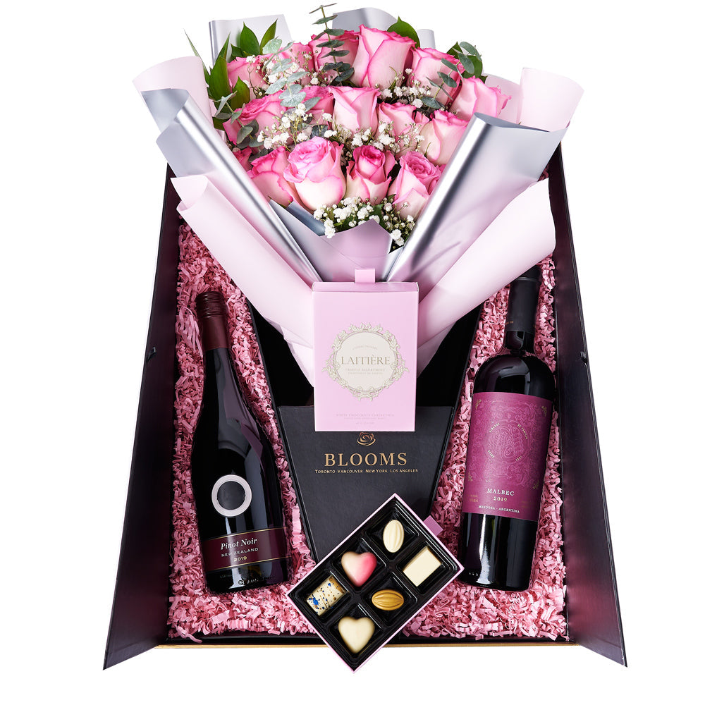 The Complete Pink Rose &amp; Wine Gift Set, a selection of pink roses and greens gathered into a floral wrap and tied with ribbon and presented in a flower box alongside two bottles of wine and a box of chocolate truffles, Floral Gifts from Vancouver Blooms - Same Day Vancouver Delivery.