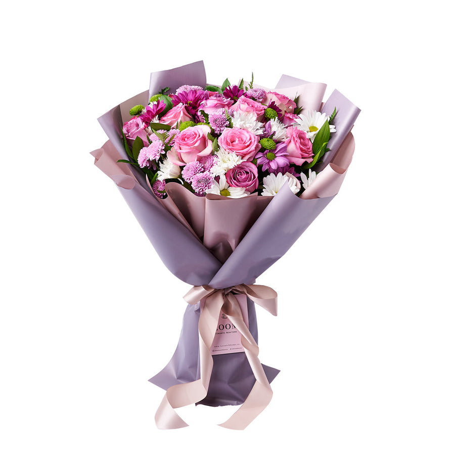 Pink & Purple Mixed Daisy Bouquet, a selection of pink and purple roses, daisies, and greens gathered into a floral wrap and tied with ribbon, Floral Gifts from Vancouver Blooms - Same Day Vancouver Delivery.