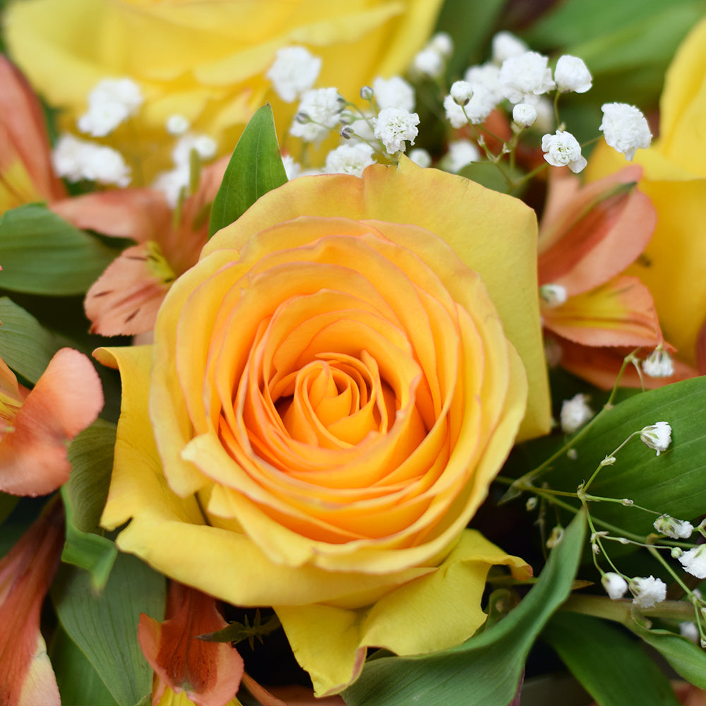 Autumnal floral hat box arrangement in yellows and oranges. Same Day Vancouver Delivery.