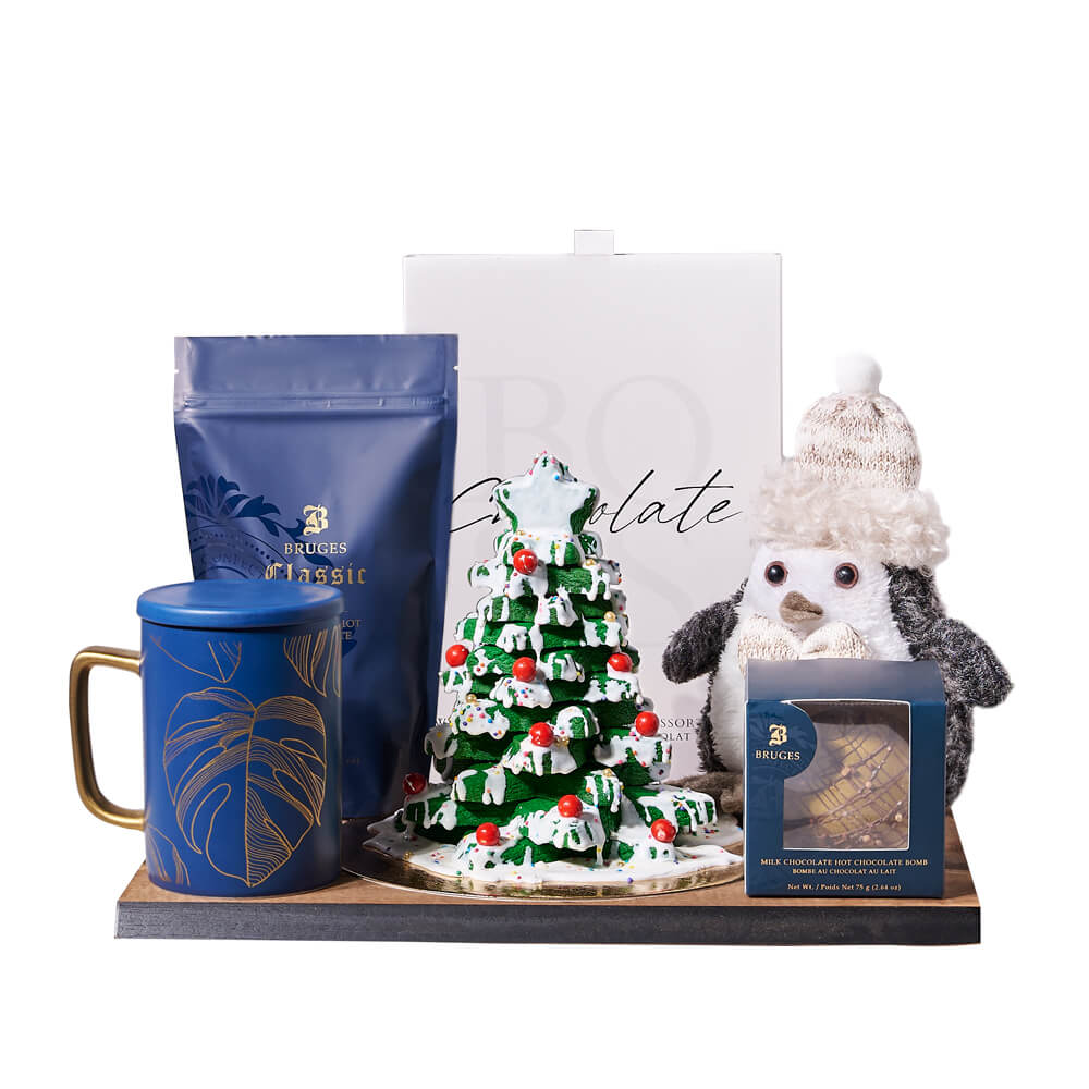 Chilly Penguin &amp; Hot Chocolate Gift Board, plush penguin character, a milk chocolate hot chocolate bomb, decadent hot chocolate, a box of chocolate truffles, a handmade Christmas tree cookie tower, a blue &amp; gold mug, and a serving board, Gourmet Gifts from Vancouver Blooms - Same Day Vancouver Delivery.