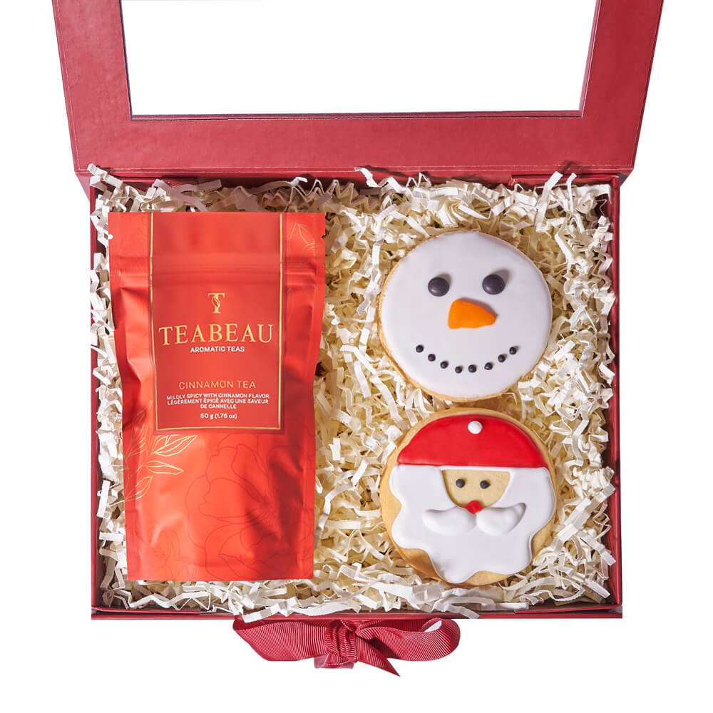 Christmas Cookie &amp; Tea Box, warmly spiced cinnamon tea, a snowman cookie, a Santa cookie, and a gift box for a delightful presentation and display, Holiday Gifts from Vancouver Blooms - Same Day Vancouver Delivery.