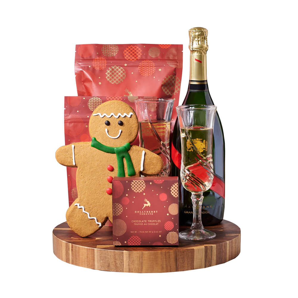 Gingerbread Man & Holiday Champagne Gift, bottle of sparkling wine, a beautiful pair of champagne flutes, a hand-decorated gingerbread cookie, chocolate truffles, white chocolate cranberry pistachio bark, white chocolate peppermint popcorn, and an end-grain cutting board for elegant serving, Holiday Gifts from Vancouver Blooms - Same Day Vancouver Delivery.
