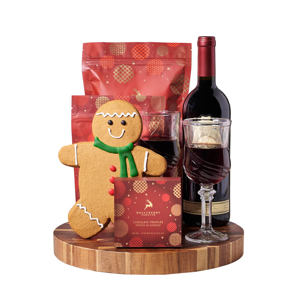 Gingerbread Man &amp; Holiday Wine Gift, bottle of wine, two wine glasses, a gingerbread cookie, chocolate truffles, white chocolate peppermint popcorn, white chocolate cranberry pistachio bark, and an end-grain cutting board, Holiday Gifts from Vancouver Blooms - Same Day Vancouver Delivery.