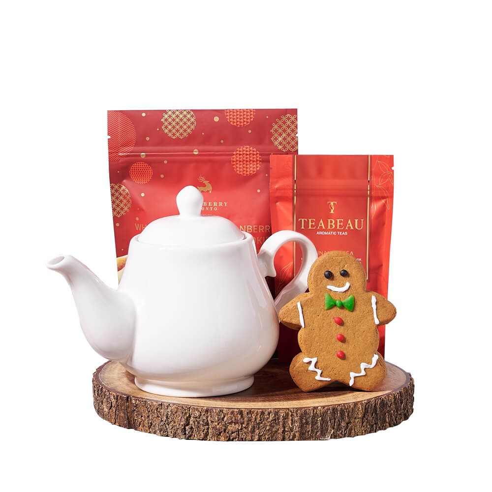Gingerbread &amp; Holiday Tea Gift, classic gingerbread man cookie, warmly spiced cinnamon tea, white chocolate cranberry shortbread cookies, a ceramic teapot, and a live-edge serving board for an elegant presentation, Holiday Gifts from Vancouver Blooms - Same Day Vancouver Delivery.