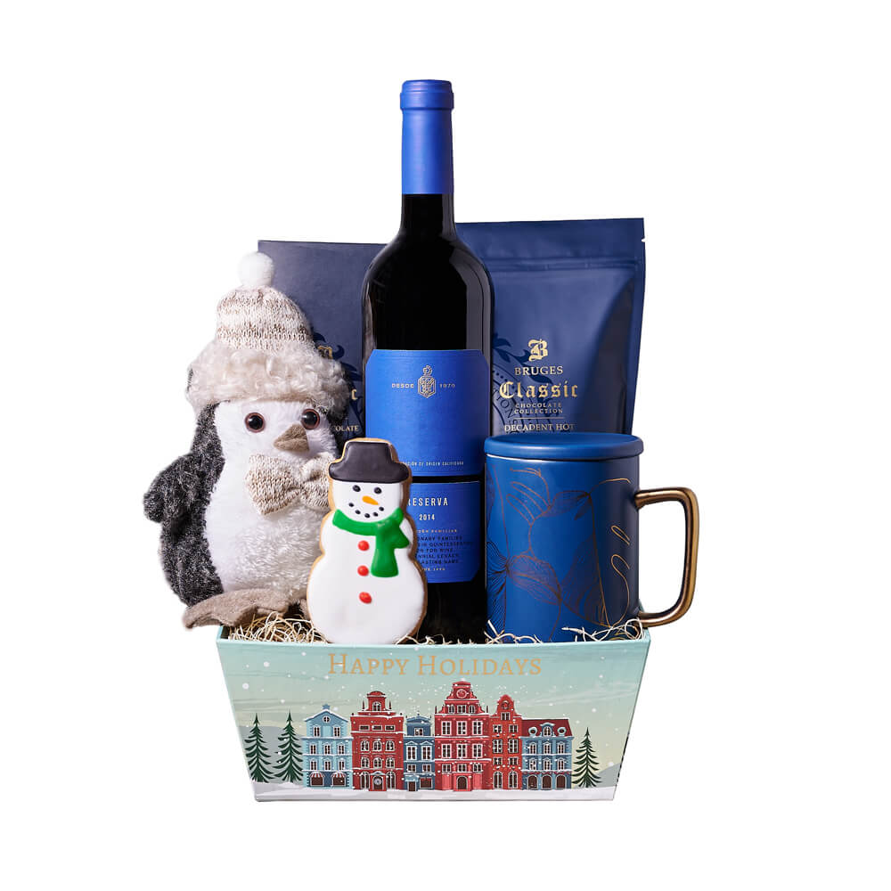 Holiday Penguin &amp; Hot Cocoa Gift Basket, bottle of wine, a charming holiday penguin plush character, hot chocolate, a dark chocolate bar, a cute hand-decorated snowman cookie, a beautiful blue and gold mug, and a gift tray for a stylish presentation and display, Holiday Gifts from Vancouver Blooms - Same Day Vancouver Delivery.