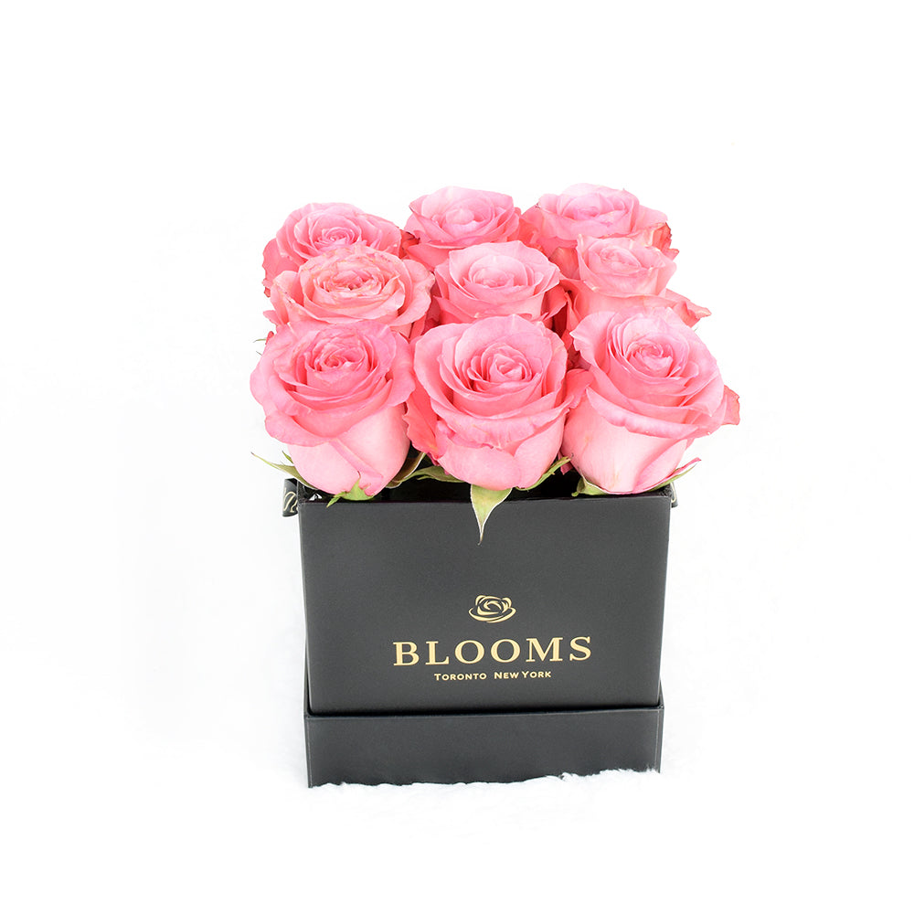 Impeccable pink rose hat box arrangement. Same Day Vancouver Delivery.