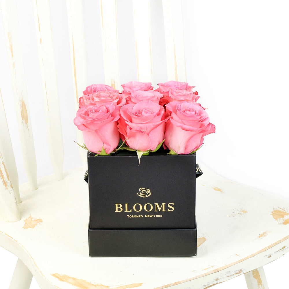 Impeccable pink rose hat box arrangement. Same Day Vancouver Delivery. 