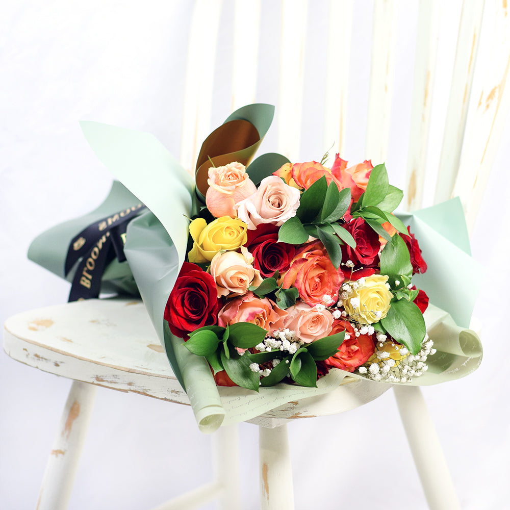 Rustic Arcadia Rose Bouquet with red, orange and yellow roses. Baby's breath and ruscus, from Vancouver Blooms - Same Day Vancouver Delivery.